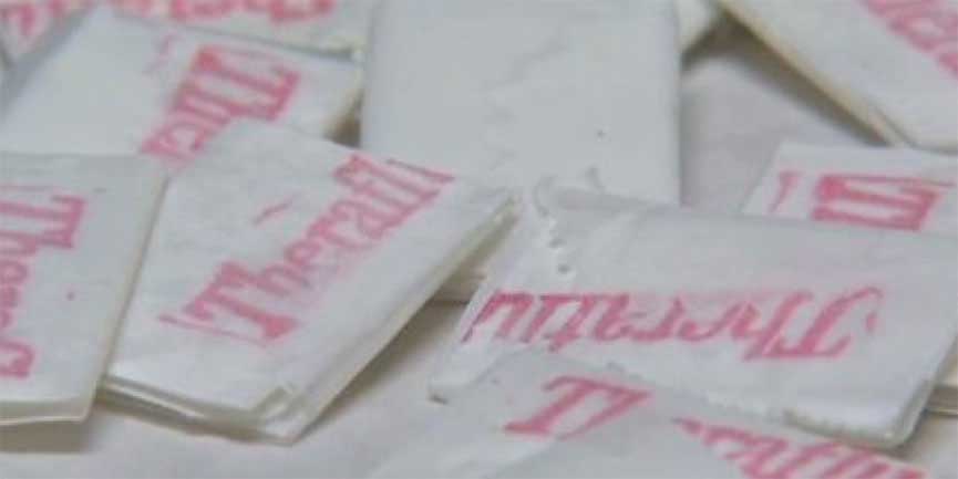 Counterfeit heroin disguised as Theraflu packaging.