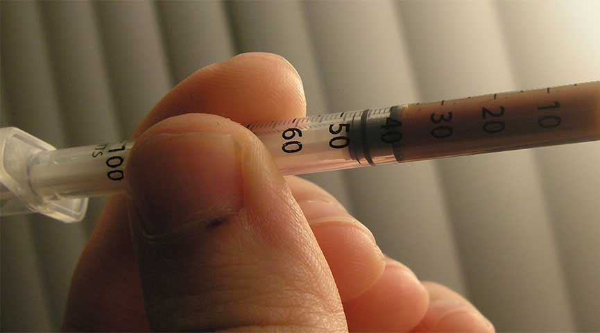 Syringe used for heroin injection illustrating the ongoing opioid crisis in Massachusetts.